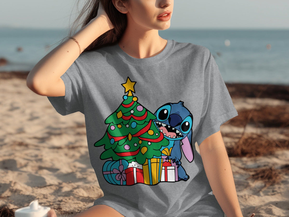 Stitch by Christmas Tree Holding Gift Boxes T-Shirts